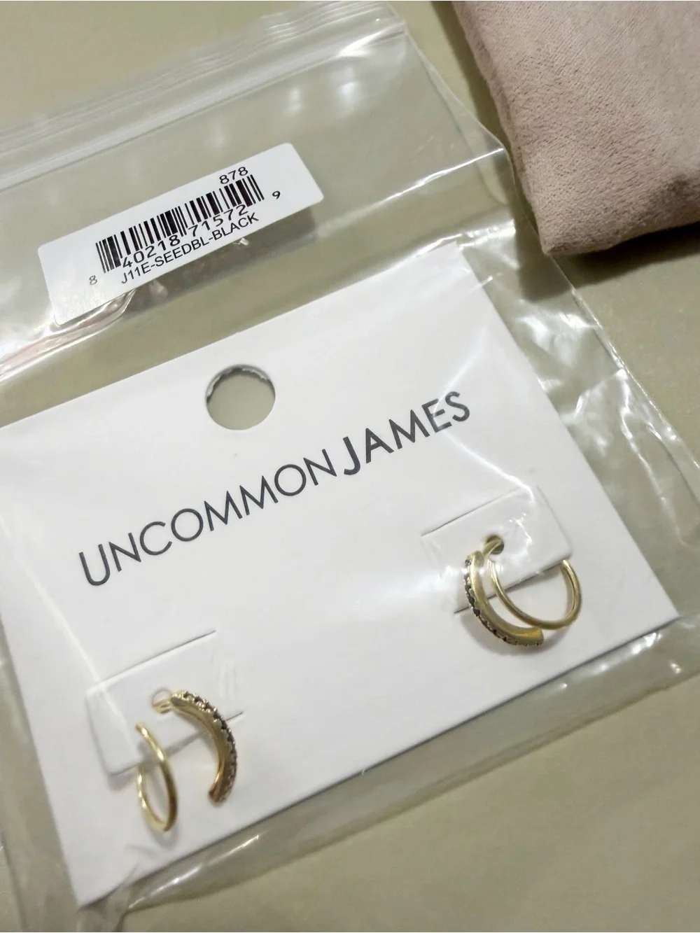 NWT Uncommon James, Seeing Double Spiral Hoop Gold Earrings with Black CZ Stones